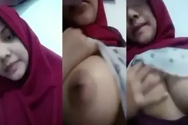 Ukhti Jilbab Merah Pamer Toket Gede Sampe Ngaceng Berat!